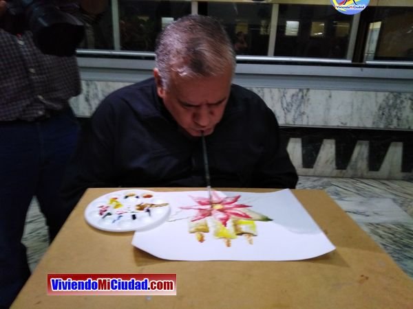 Joel Ramos en el Dia Munidal Pintor Boca y Pie